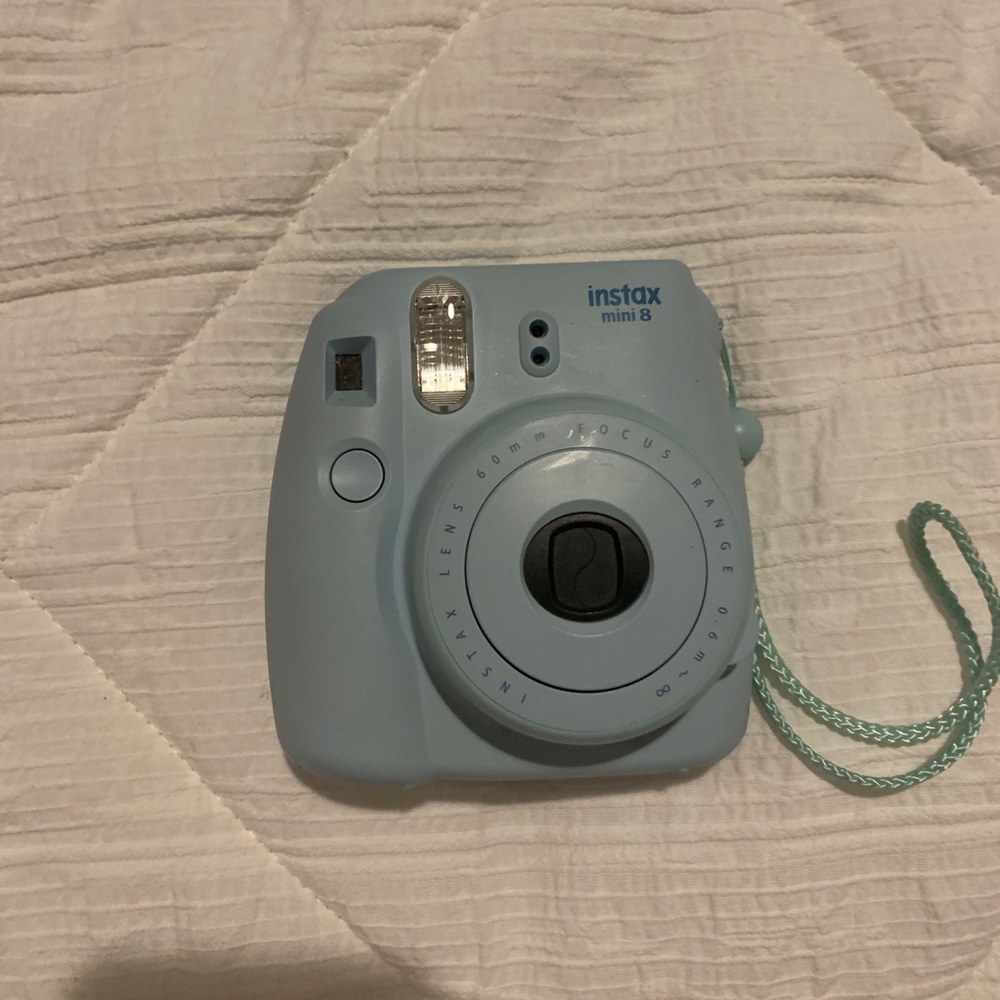 Blue Polaroid camera